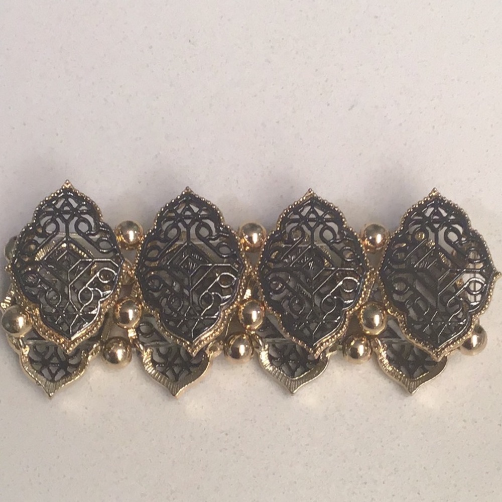 Grey and gold bracelet